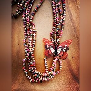 4 Strand Died wood beaded statement necklace.